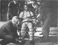 tn-strapping-the-victim-into-the-death-chair-redux